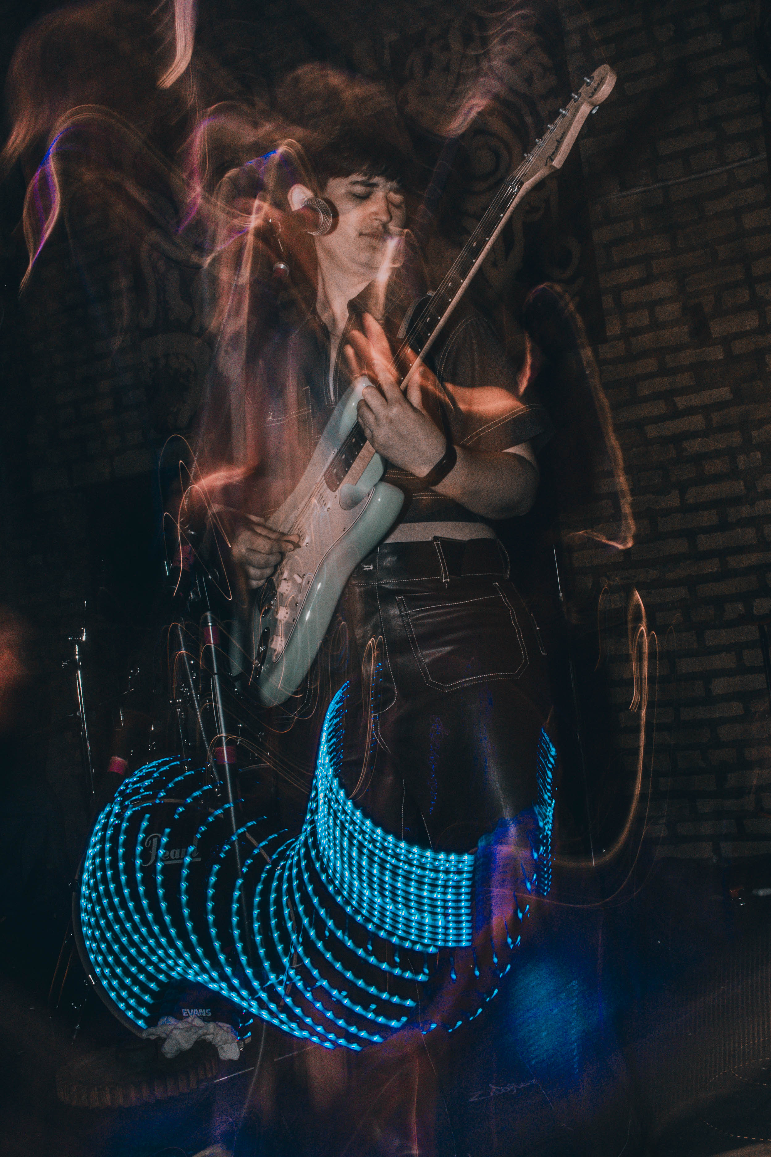 Abby performing with Stratocaster and LED light trails