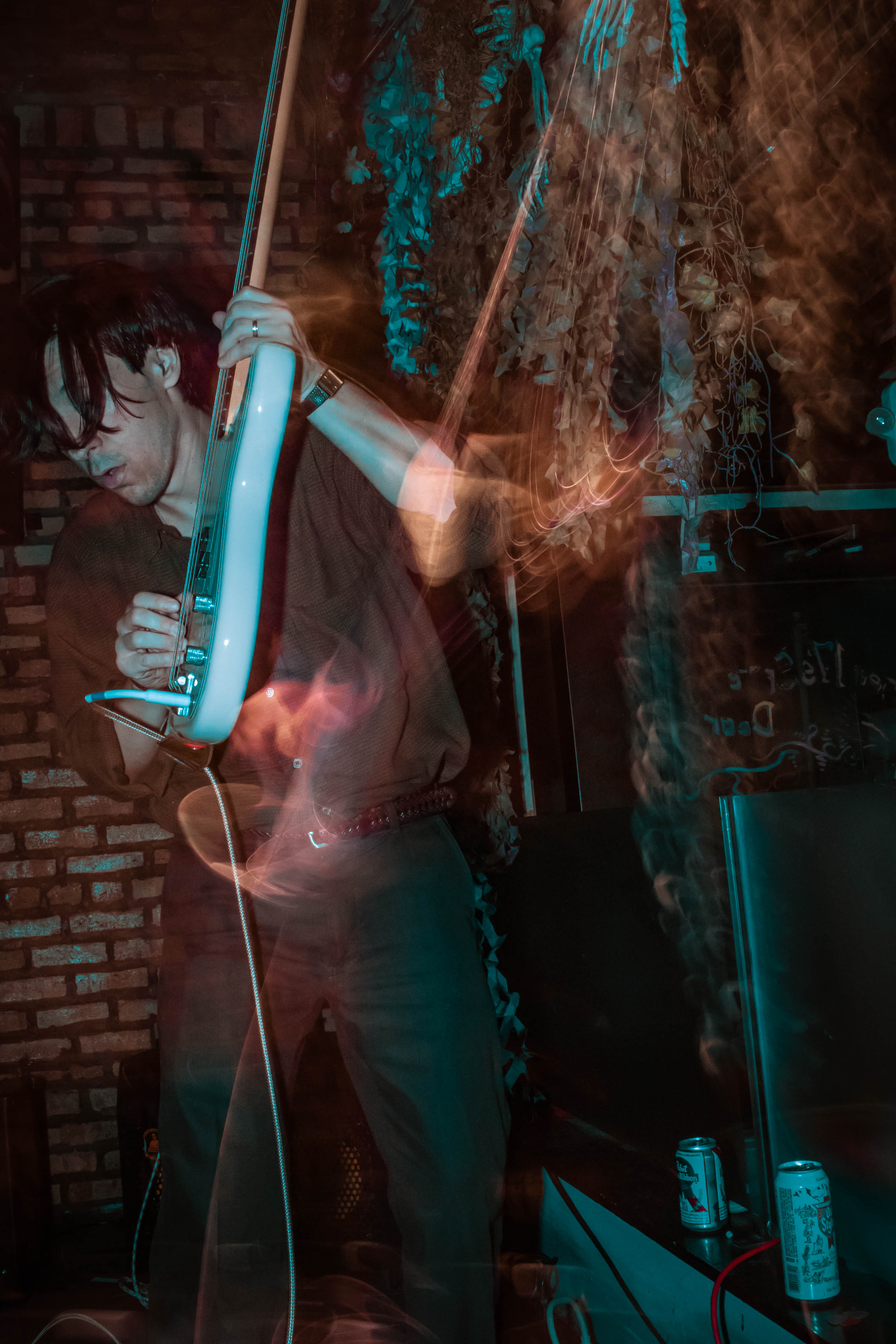 Dave performing on bass with motion blur